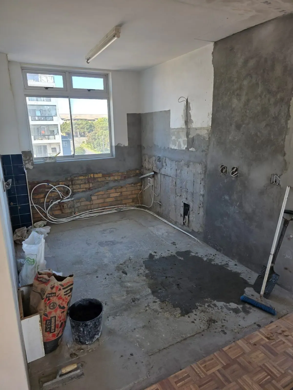 A Ground Seed Designs kitchen before: an unfinished room